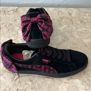 PUMA Women's Black Suede Sneakers with Pink Accents